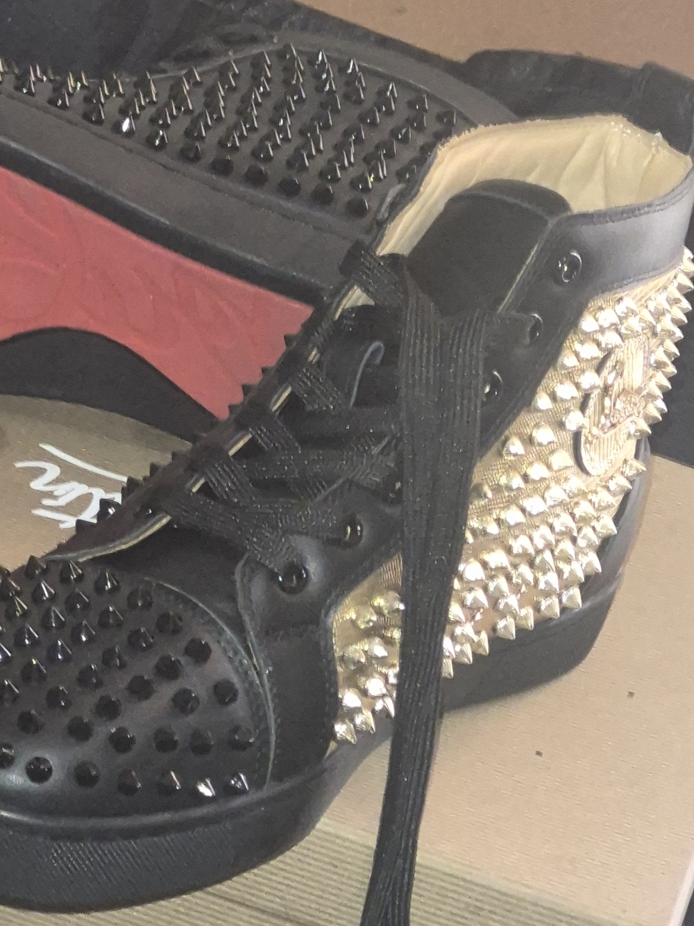Christian Louboutin Black Leather Sneakers with Gold Spikes and Red Sole